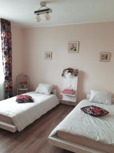 Postel nebo postele na pokoji v ubytování Kara Apartman