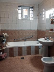 Koupelna v ubytování Kara Apartman