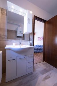 Ванна кімната в Casa di ALICE