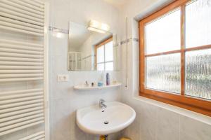 Kúpeľňa v ubytovaní Strickerhof Appartment 1