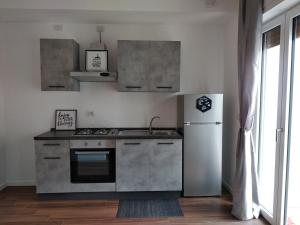 A kitchen or kitchenette at Sevi modern stay