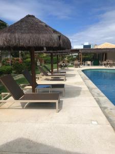 Bazén v ubytování Apartamento no Condomínio Iberostate Praia do Forte nebo v jeho okolí