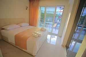 Posteľ alebo postele v izbe v ubytovaní Sky Rays Luxury Apartments
