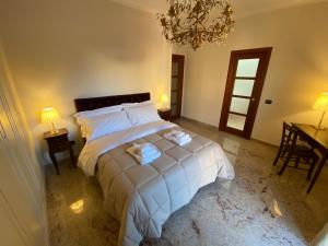 A bed or beds in a room at B&B San Michele Foggia