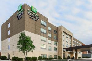 a rendering of the front of a holiday inn express hotel at Holiday Inn Express & Suites Chicago O'Hare Airport, an IHG Hotel in Des Plaines