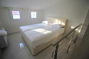 Posteľ alebo postele v izbe v ubytovaní Sky Rays Luxury Apartments