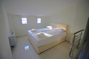 Posteľ alebo postele v izbe v ubytovaní Sky Rays Luxury Apartments