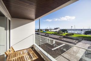 a view from the balcony of a building at Hotel Gaivota Azores in Ponta Delgada