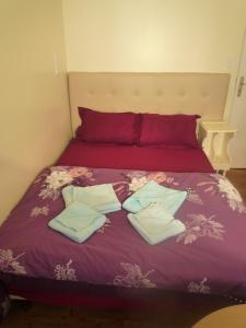 Postel nebo postele na pokoji v ubytování Hôtel Lyonnais