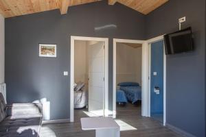 Łóżko lub łóżka w pokoju w obiekcie TEIRABOA BASE CAMP