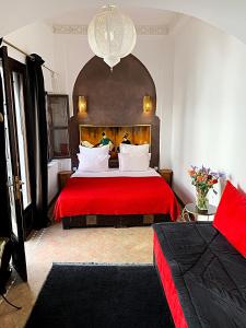 Cama o camas de una habitación en Riad Dar Massaï