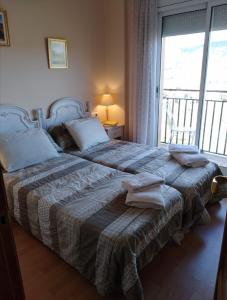 Posteľ alebo postele v izbe v ubytovaní CAL SOLÉ