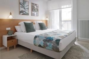 Posteľ alebo postele v izbe v ubytovaní Olatu by FeelFree Rentals