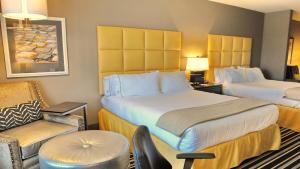 Voodi või voodid majutusasutuse Holiday Inn Express Covington-Madisonville by IHG toas