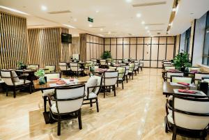 En restaurant eller et andet spisested på Days Inn by Wyndham Business Place Sichuan Bazhong