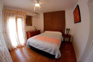 Katil atau katil-katil dalam bilik di Villa Teresa