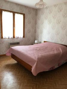 Llit o llits en una habitació de La Maison Trèfle