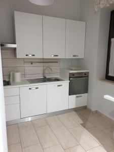 Kuchyň nebo kuchyňský kout v ubytování B&B Solferino