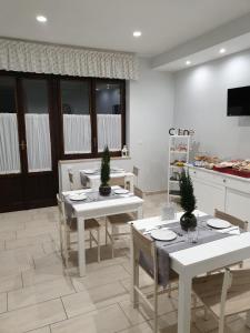 TV a/nebo společenská místnost v ubytování B&B Solferino