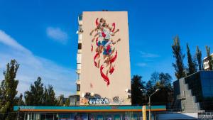 a large billboard on the side of a building at Шикарная 2к квартира Большая Васильковская 145, Оушен Плаза in Kyiv