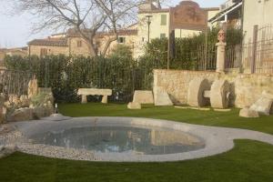 Vonkajšia záhrada v ubytovaní B&B Il Sogno del Pinzagrilli