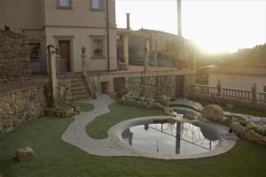 Vonkajšia záhrada v ubytovaní B&B Il Sogno del Pinzagrilli