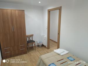 Łóżko lub łóżka w pokoju w obiekcie Apartemento Pablo