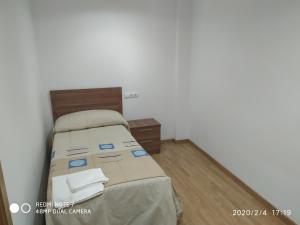 Łóżko lub łóżka w pokoju w obiekcie Apartemento Pablo