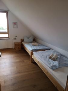 מיטה או מיטות בחדר ב-1Austragshaus Andermichlhof