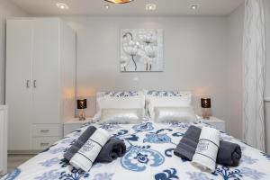 Postel nebo postele na pokoji v ubytování Luxury apartman BOSSE