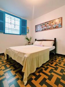 Posteľ alebo postele v izbe v ubytovaní Zili Pernambuco - Hostel Pousada