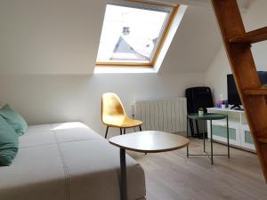 Khu vực ghế ngồi tại FleuryBis - Appartement calme proche de Rouen
