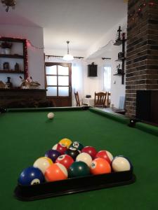 a pile of billiard balls on a pool table at Mazurski Staw in Gołdap