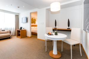 Rúm í herbergi á Hotel Melia Lima