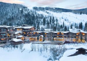 a resort in the winter with snow on the ground at Manor Vail Lodge in Vail
