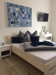 Łóżko lub łóżka w pokoju w obiekcie Apartmán nad Imperiálem