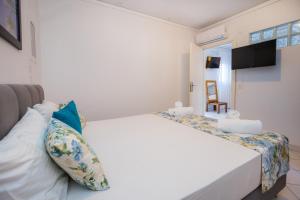 Postel nebo postele na pokoji v ubytování Hotel Potos
