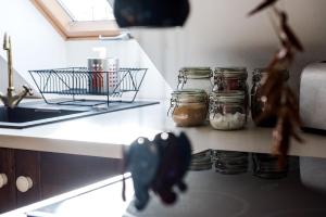 Kuchyň nebo kuchyňský kout v ubytování St. Gellért Square - Minilux Apartman