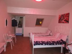 Postel nebo postele na pokoji v ubytování Retro apartment