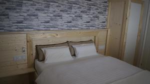 Кровать или кровати в номере Land - Haus