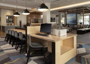 an office with a desk with a computer on it at Hyatt House San Jose Airport in San Jose