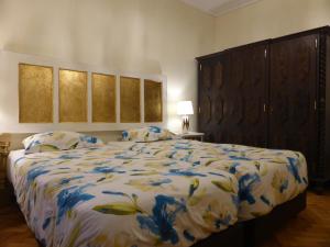Кровать или кровати в номере Bento Boutique Apartment - IBG HOME