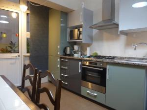 Kjøkken eller kjøkkenkrok på Bento Boutique Apartment - IBG HOME