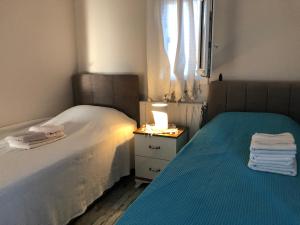 Ένα ή περισσότερα κρεβάτια σε δωμάτιο στο Villa Tibet +39 φωτογραφίες