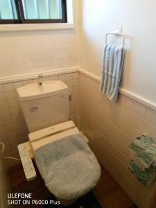 Koupelna v ubytování 手広beachbackpackers