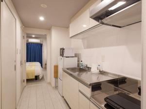Gallery image of Kariyushi Condominium Resort Miyakojima Fukugi Stays in Miyako Island