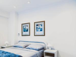Кровать или кровати в номере Seaview Penthouse Arpoador