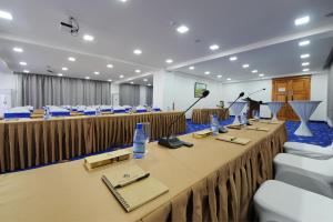 The business area and/or conference room at UB Grand Hotel