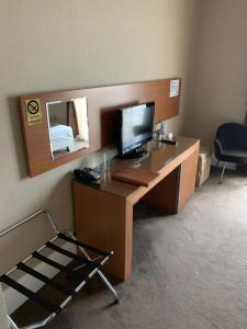 A television and/or entertainment centre at City Hotel Plovdiv