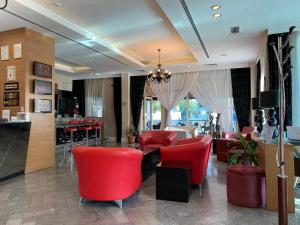 A kitchen or kitchenette at City Hotel Plovdiv